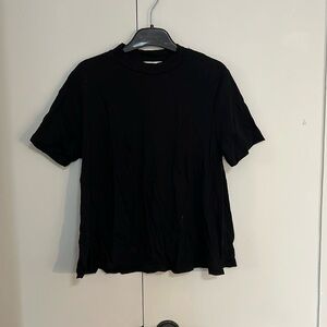 t.La Flared Black Tee